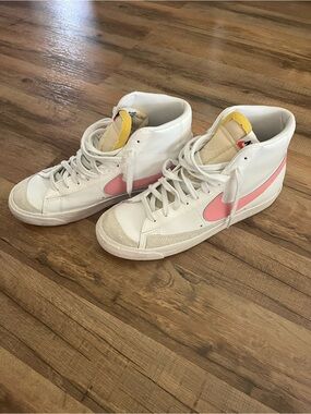 Nike Women's High-Top Sneakers in White with Pink Swoosh